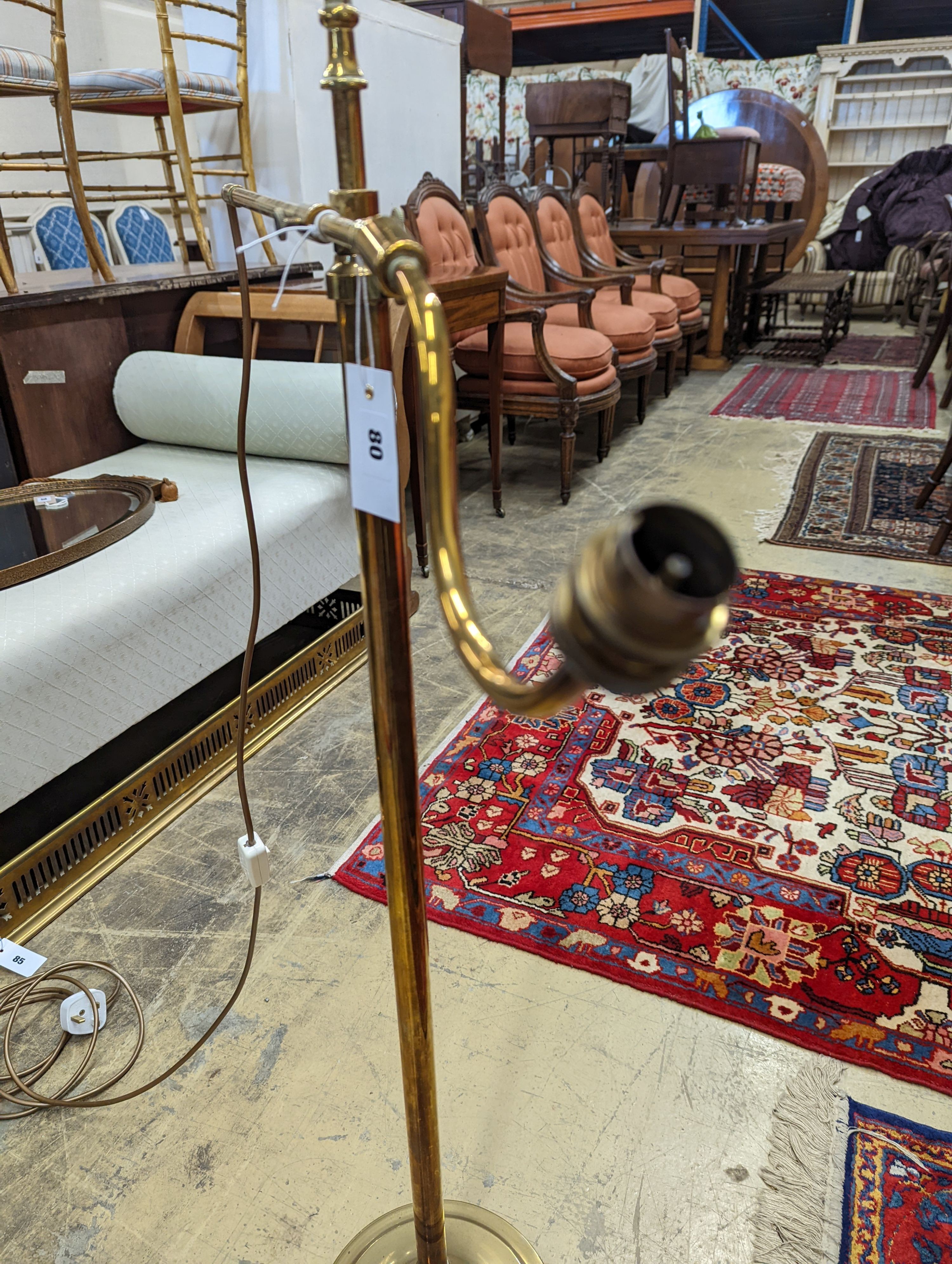 An Edwardian brass telescopic floor lamp converted to electricity